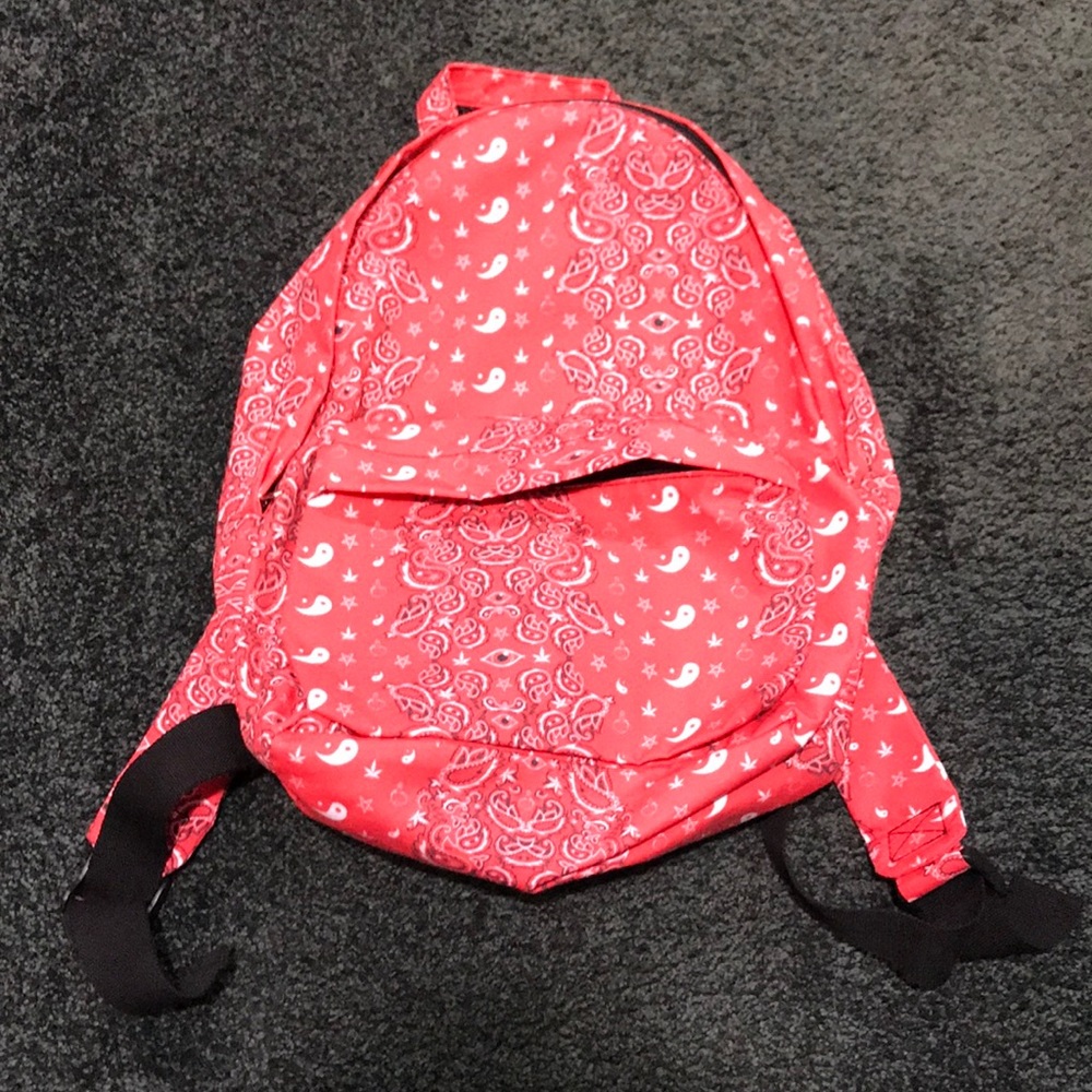 Red paisley eyeball ying yang book bag
